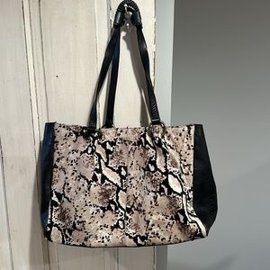 Maurizio Taiuti leather & hair bag. 16” long, 12” tall